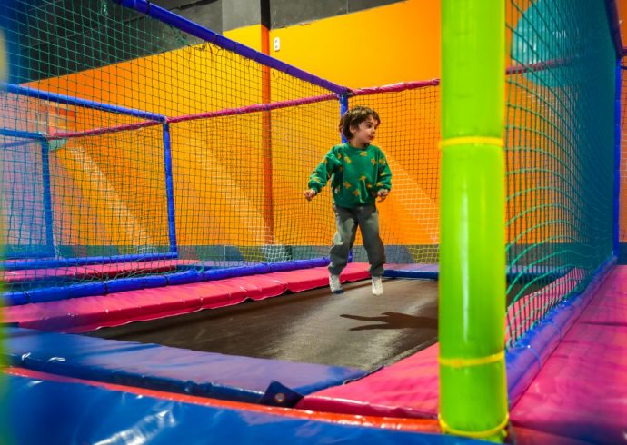 Groß (child-jumping-and-having-fun-on-colorful-trampolin-2025-10-06-19-00-51-utc)
